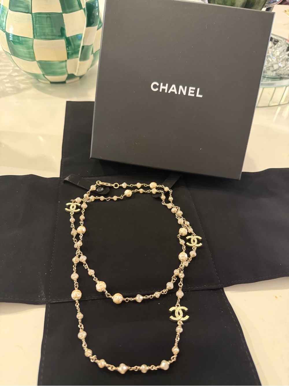 CHANEL Gold Pearl Long Necklace with CC Logos